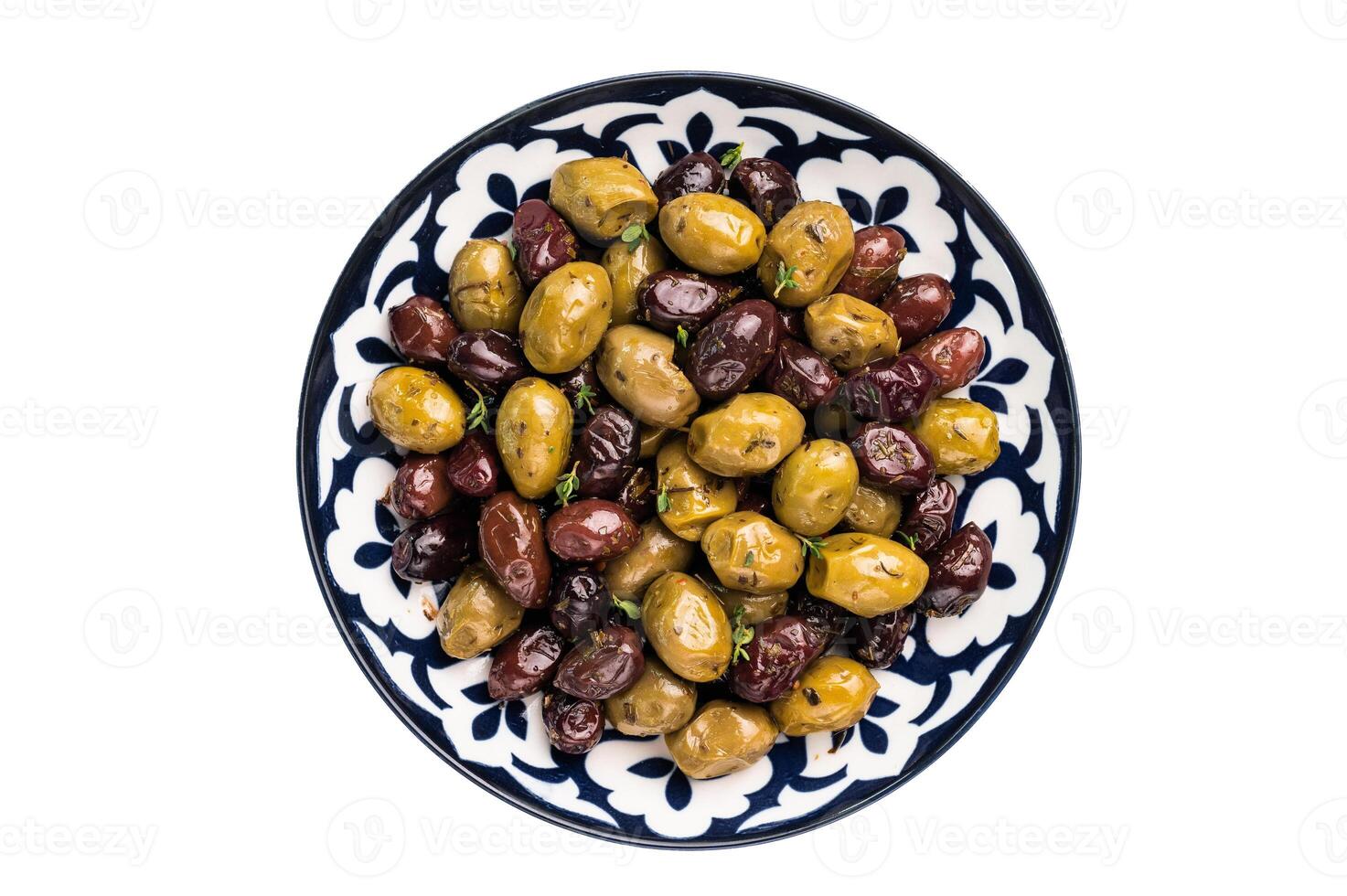 Mix olives with herbs and oil plate isolated on white background. photo