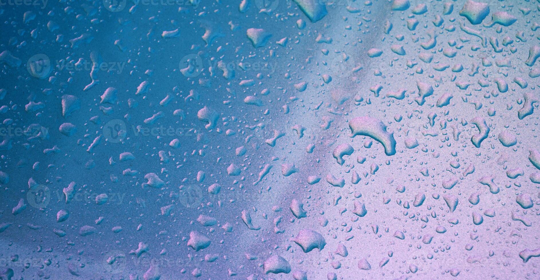 abstract pearl background with texture of rain drops on metal surface close-up photo