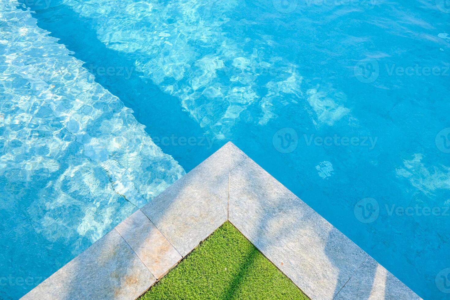 Blue tiles texture in swimming pool. photo