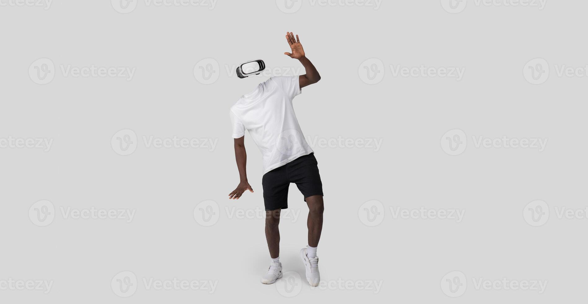 A person is engaged with modern virtual reality technology, wearing a headset and using a device to explore immersive environments. photo