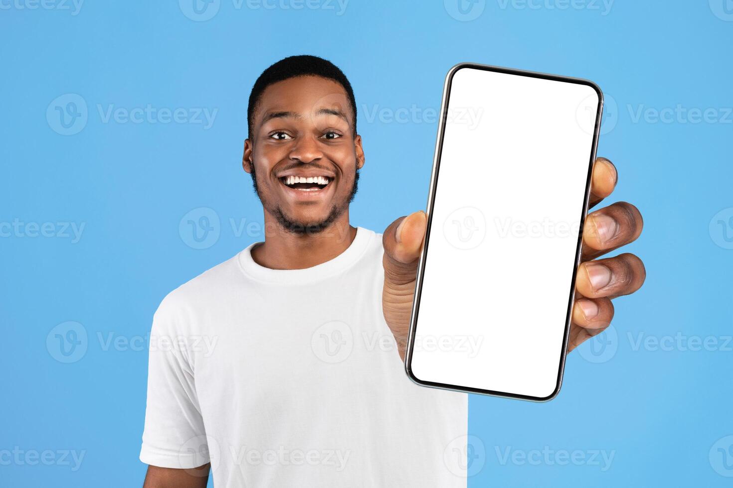 Number Three. African American Guy Showing Three Fingers Counting Standing Over Blue Background. Studio Background photo