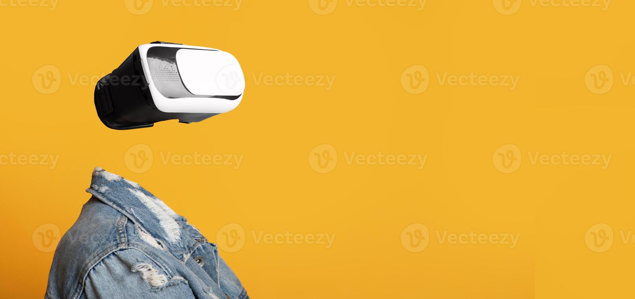 A user experiences virtual reality with a sleek headset, creating a modern and immersive atmosphere. The individual's head is not visible, emphasizing the gadget and vibrant backdrop. photo