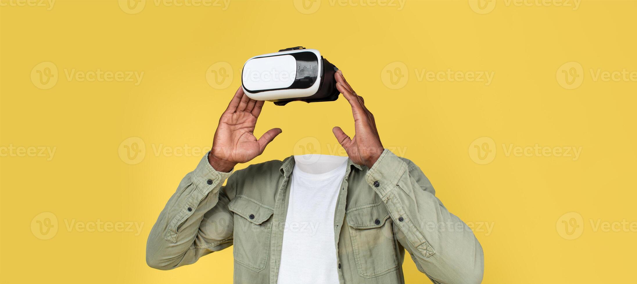 A person interacts with virtual reality equipment, showcasing advanced technology. photo