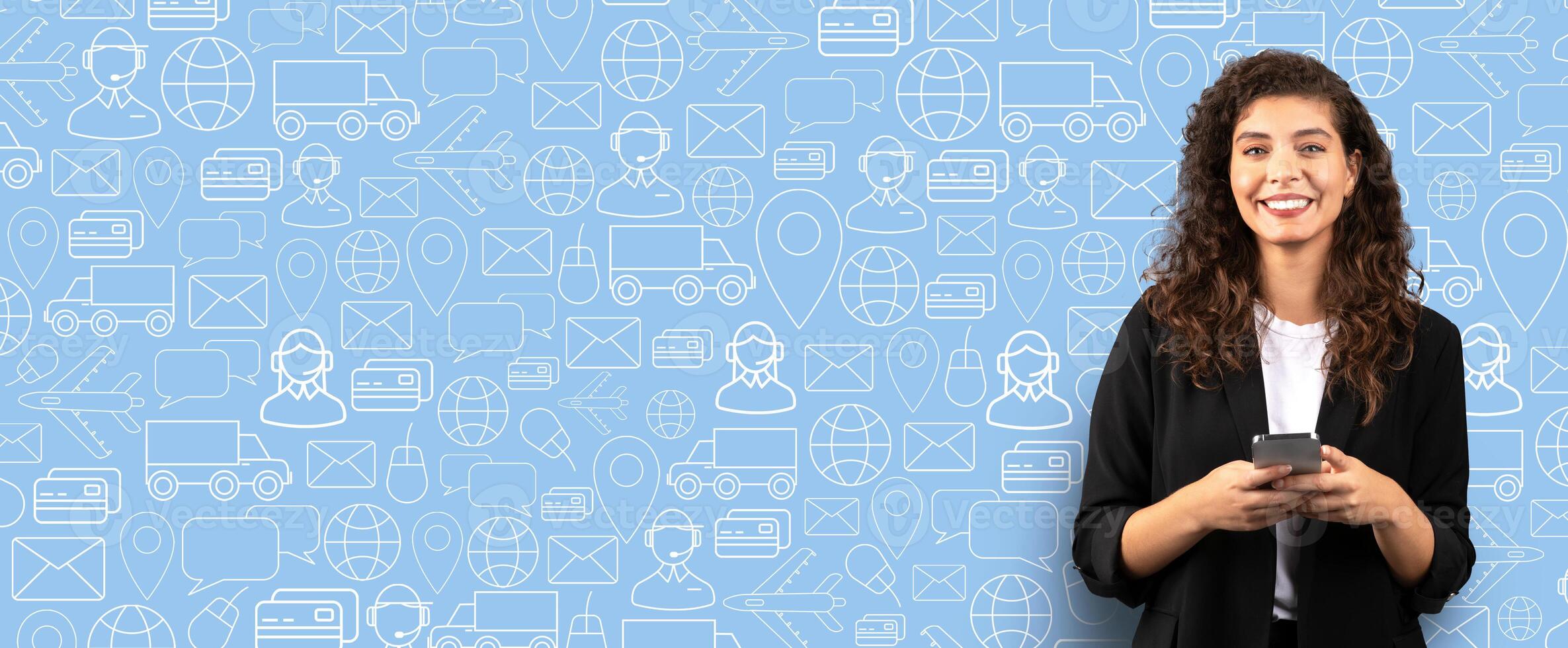 A person stands smiling while holding a smartphone, engaging in online shopping. The background features icons related to delivery services, commerce, and digital communication. photo