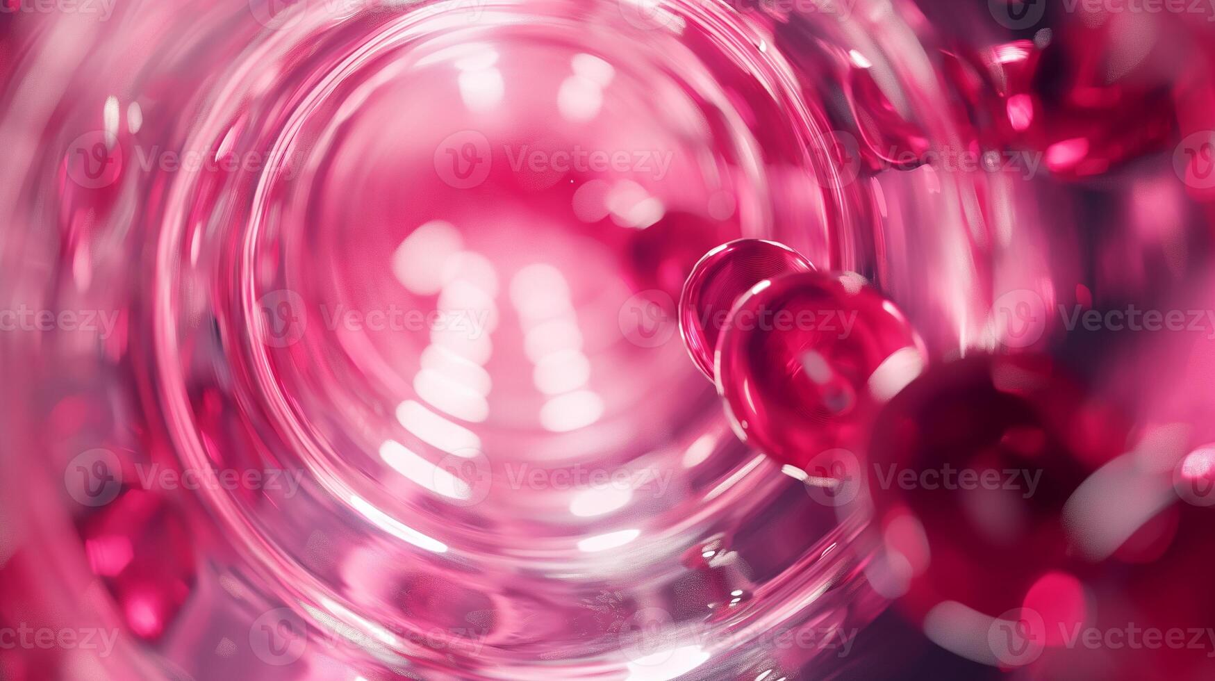 This Red particles swirl in a clear cylinder, demonstrating synthetic blood properties. photo
