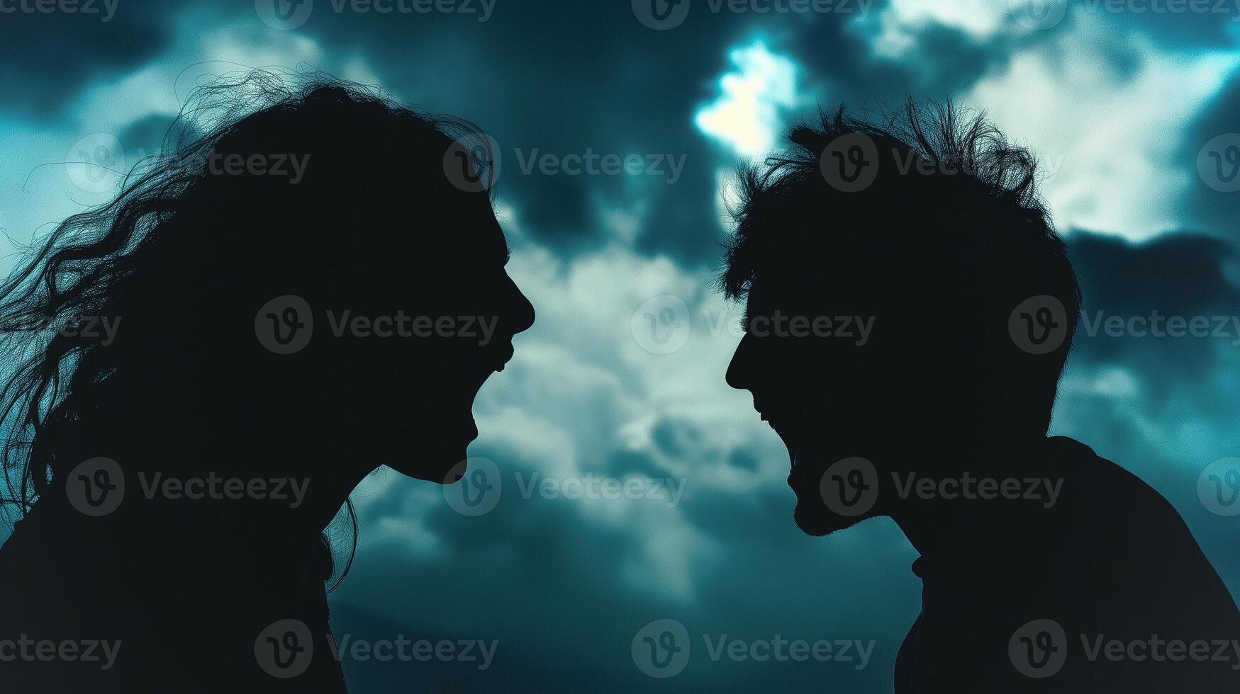 This Two people argue passionately, silhouetted against a stormy sky, depicting tension and disagreement. photo