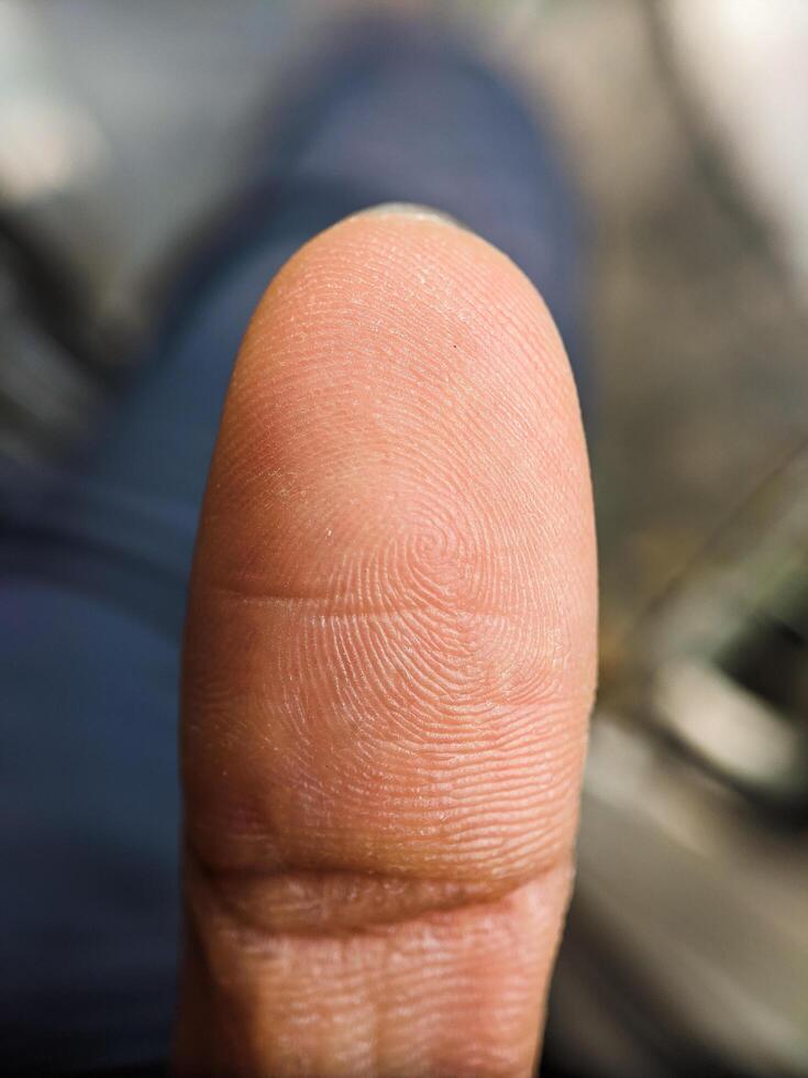 Fingerprints on thumbs taken with a macro lens photo