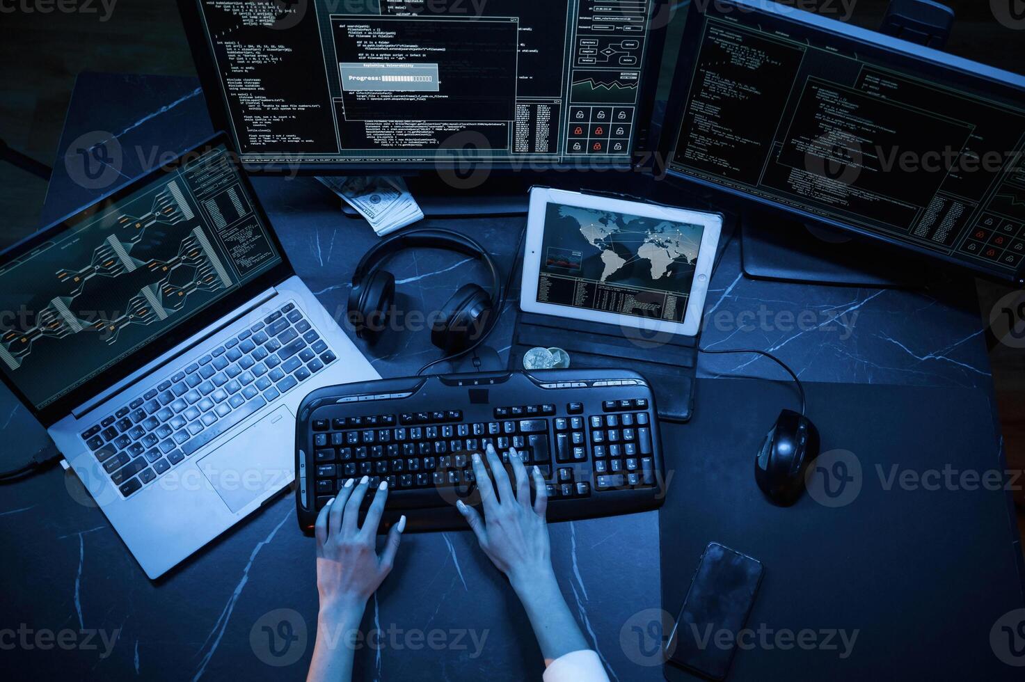 Close up top view of female hacker hands,, typing on keyboard photo