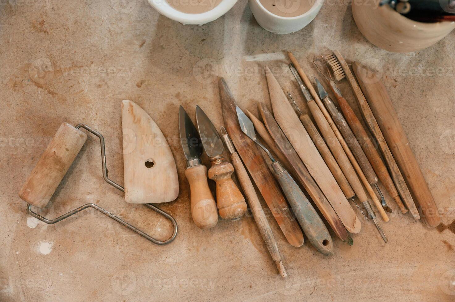 Pottery tools. Close ,up view of the table with instruments photo