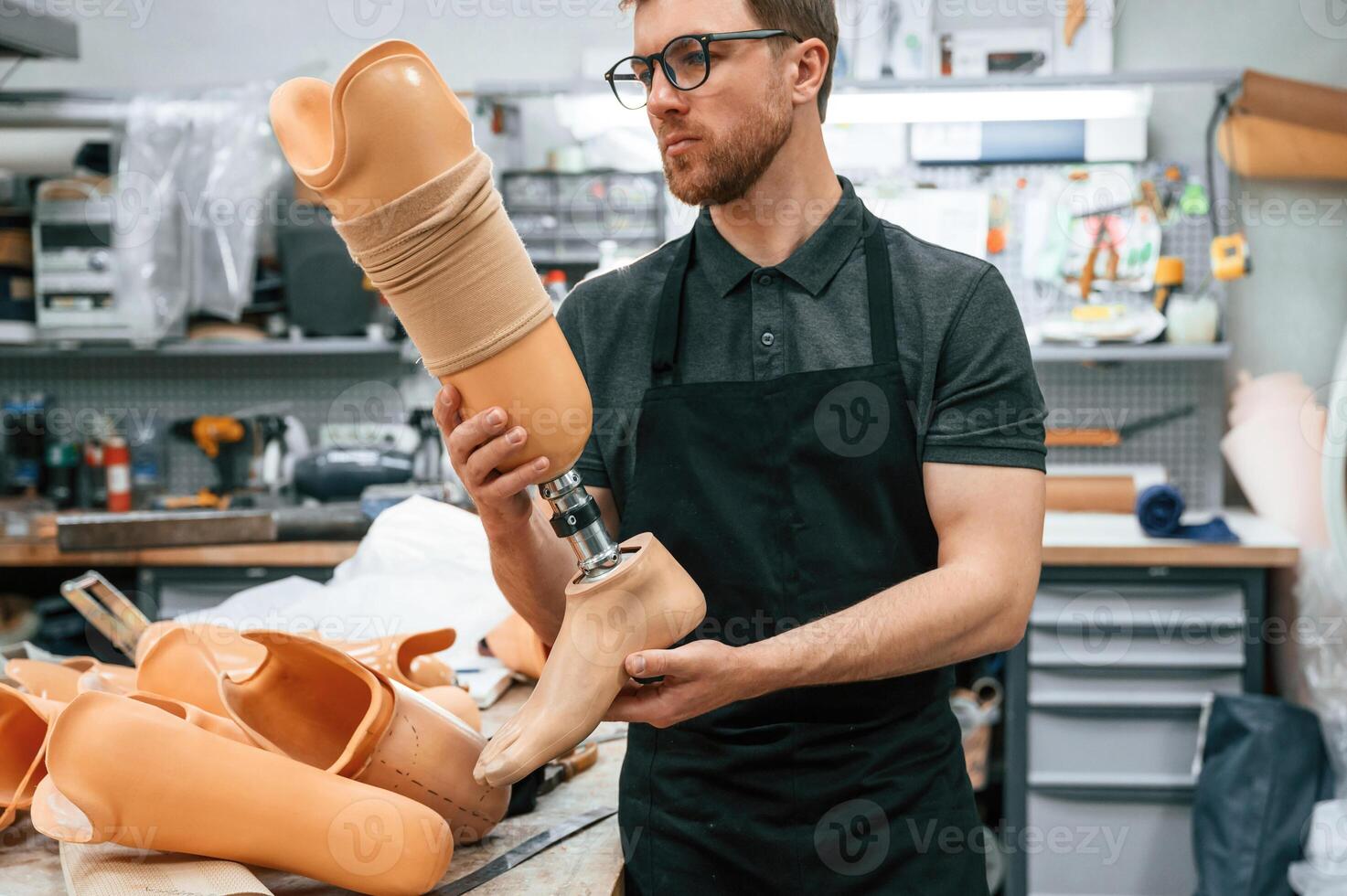 Technician ,working with prosthesis in ,modern laboratory photo