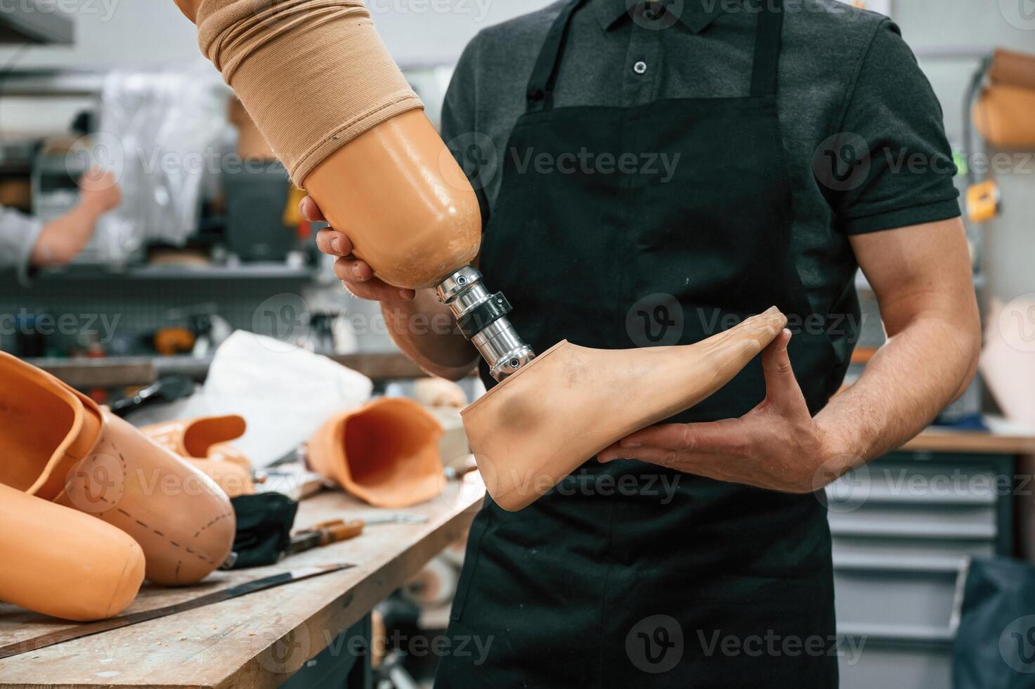 Close ,up view. Technician holding prosthesis in hands photo