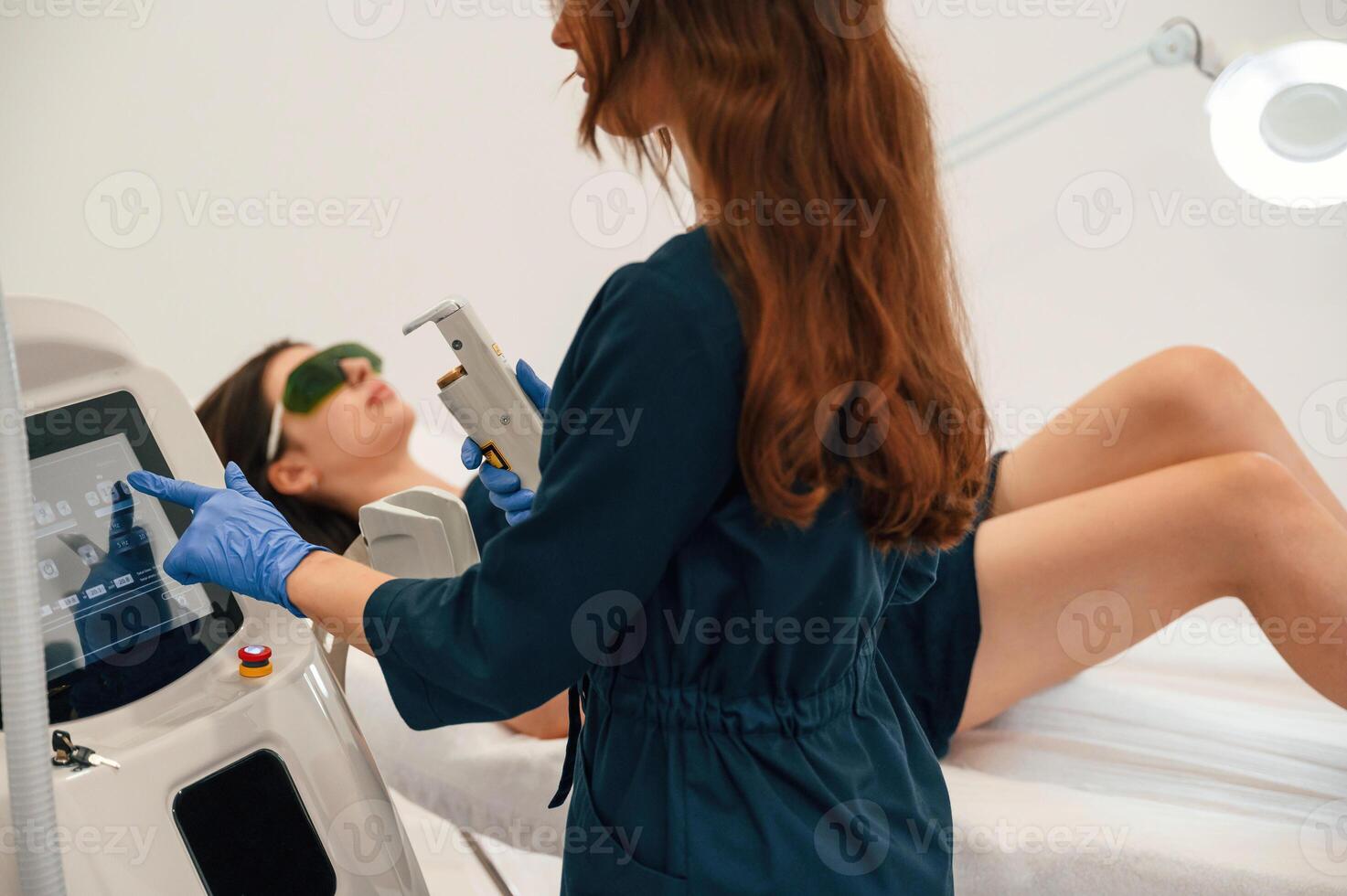 Preparing ,for photo rejuvenation ,procedure at cosmetology clinic. Women in beauty salon