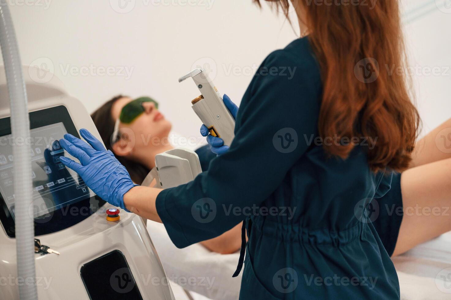 Preparing, for photo rejuvenation procedure at cosmetology clinic. Women in beauty salon