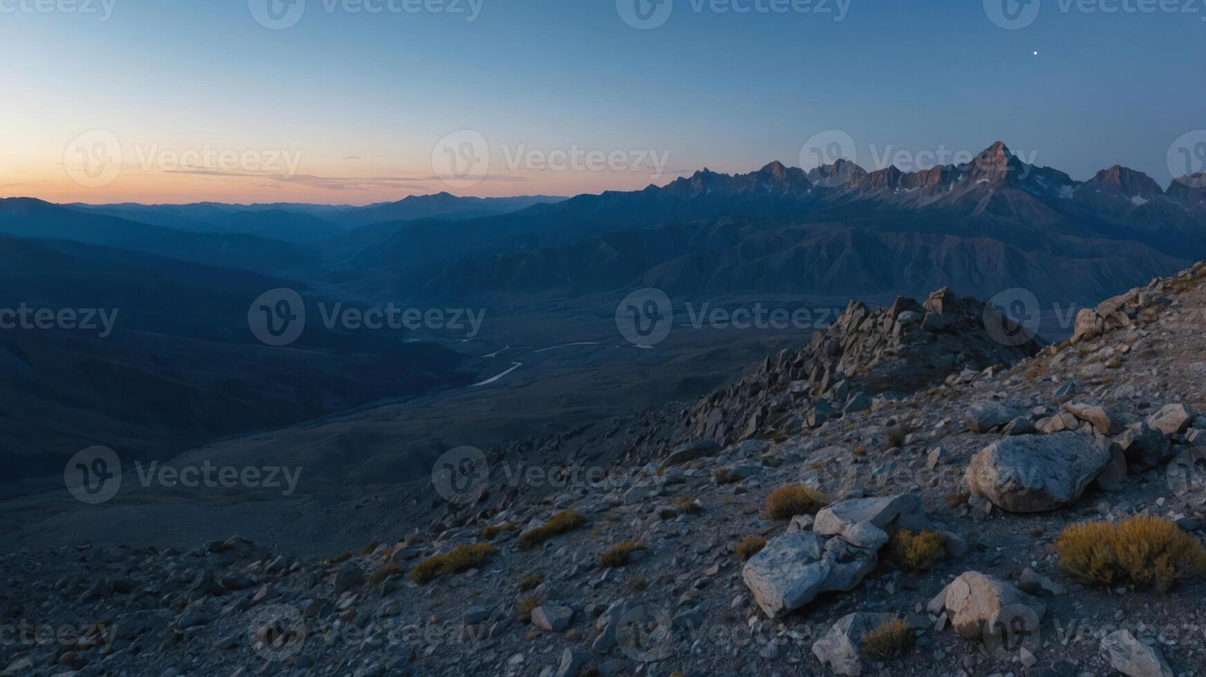 Majestic Mountains Valley View From Rocky Peak at Dusk photo