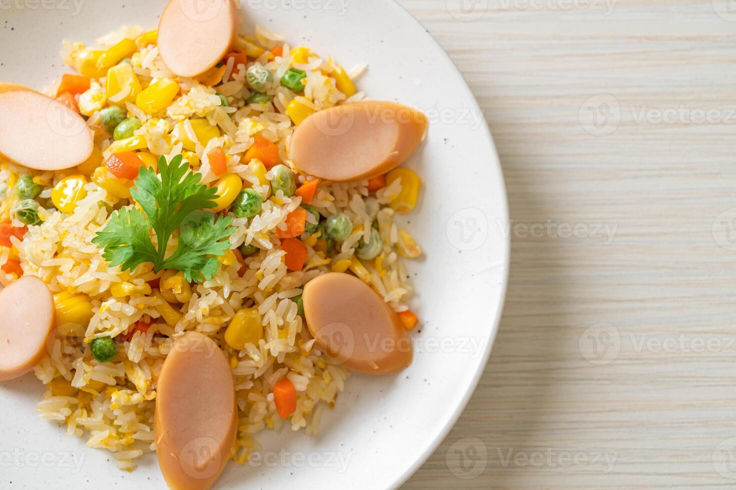 fried rice with sausage and mixed vegetable. photo