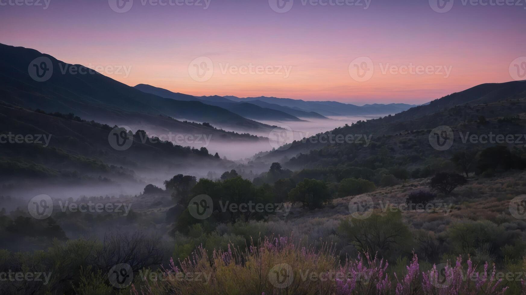 Fog Rolling Through Mountain Valley at Dawn with Pastel Sky photo