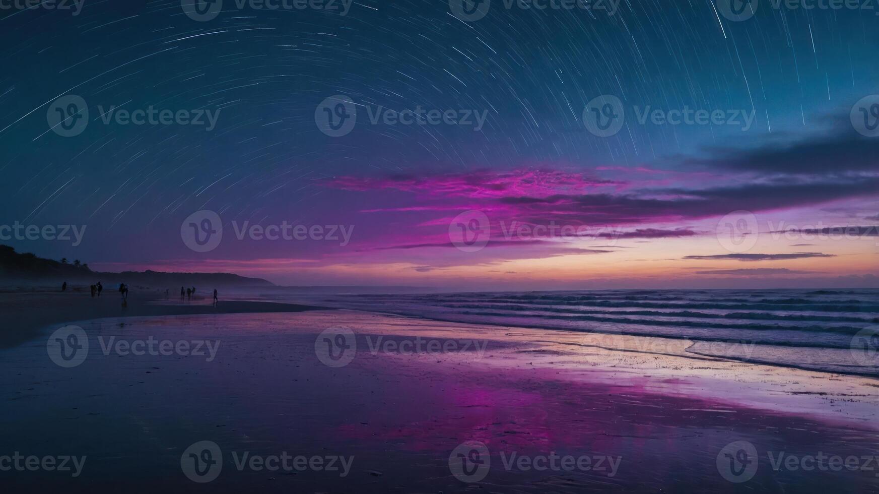 Star Trails Over Ocean Beach at Night with Colorful Sky photo