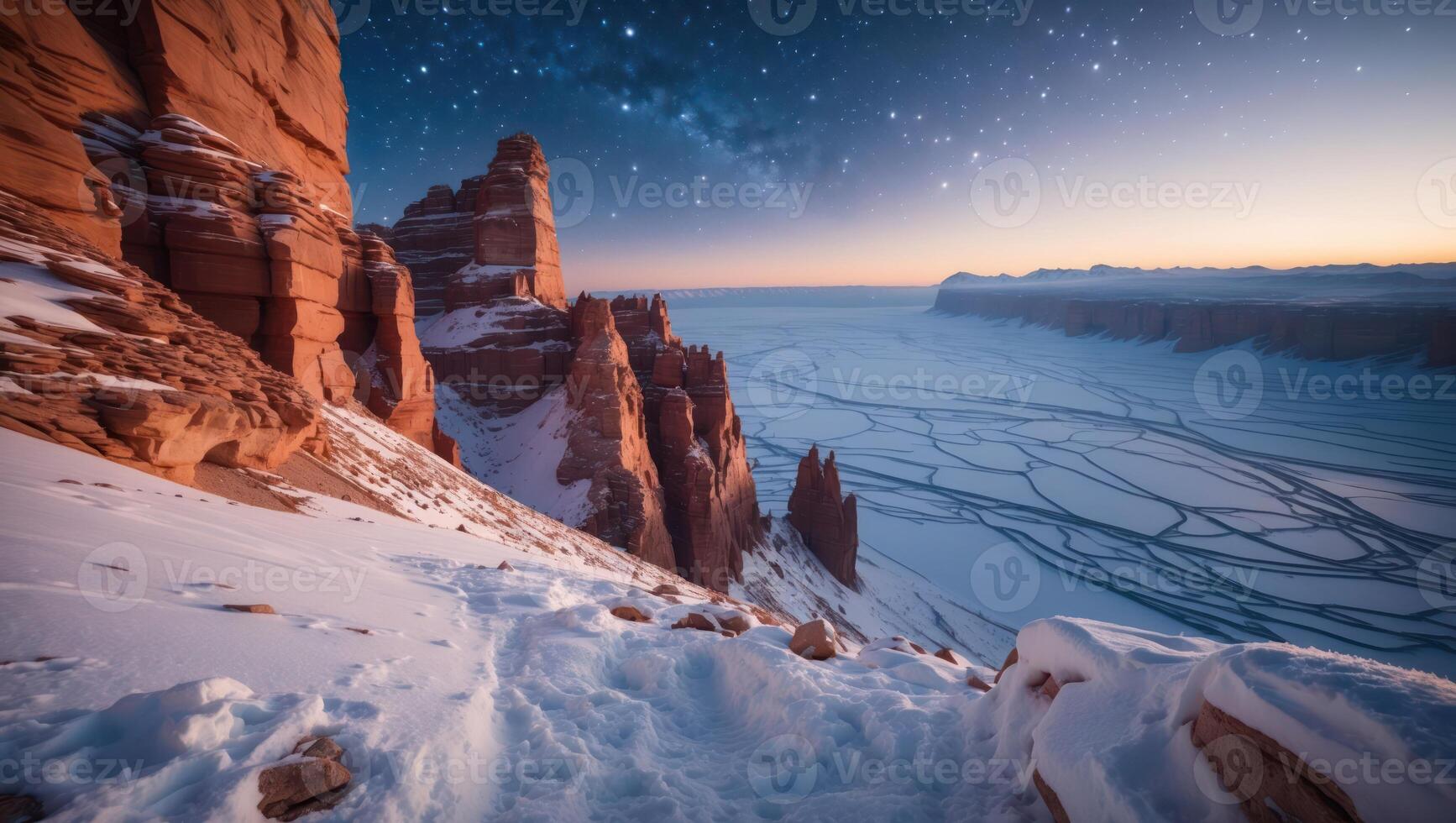 Snowy Canyon Landscape with Rock Formations Under a Starry Night Sky photo
