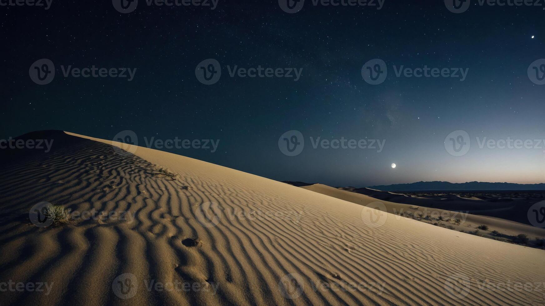 Desert Sand Dune at Night with Stars and Moon in Sky photo