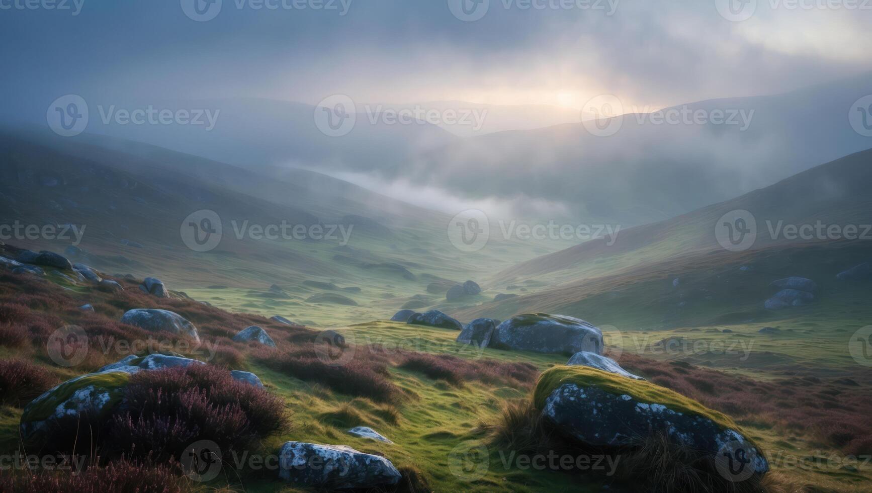 Tranquil Valley Landscape with Fog Rolling Over Mossy Rocks photo