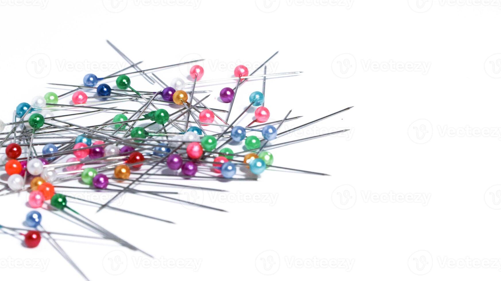 Safety pins are usually used to attach cloth and hijab. Opaque straight safety pin. Made of stainless steel with a pointed tip, photo