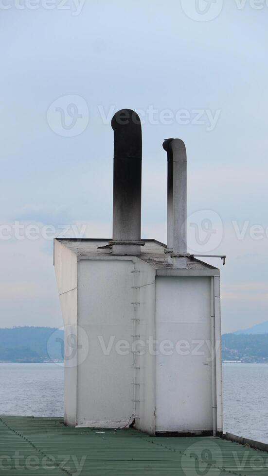 White smoke chimney background on blue sky. photo
