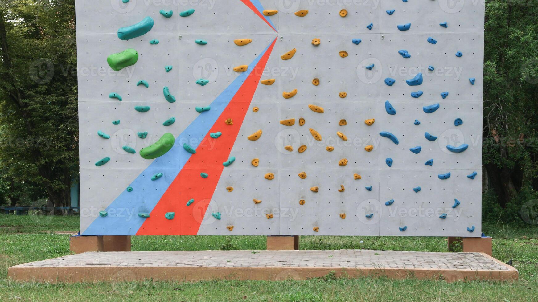 Most climbing walls are equipped with harnesses, photo