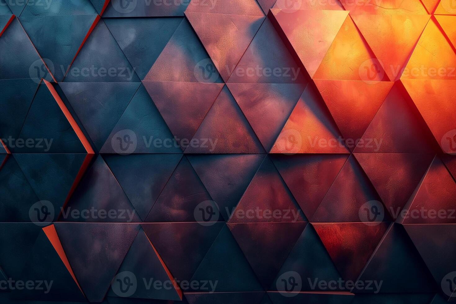 A close-up of a textured triangular wall featuring vibrant hues of orange and deep blue, creating a modern architectural feel. photo