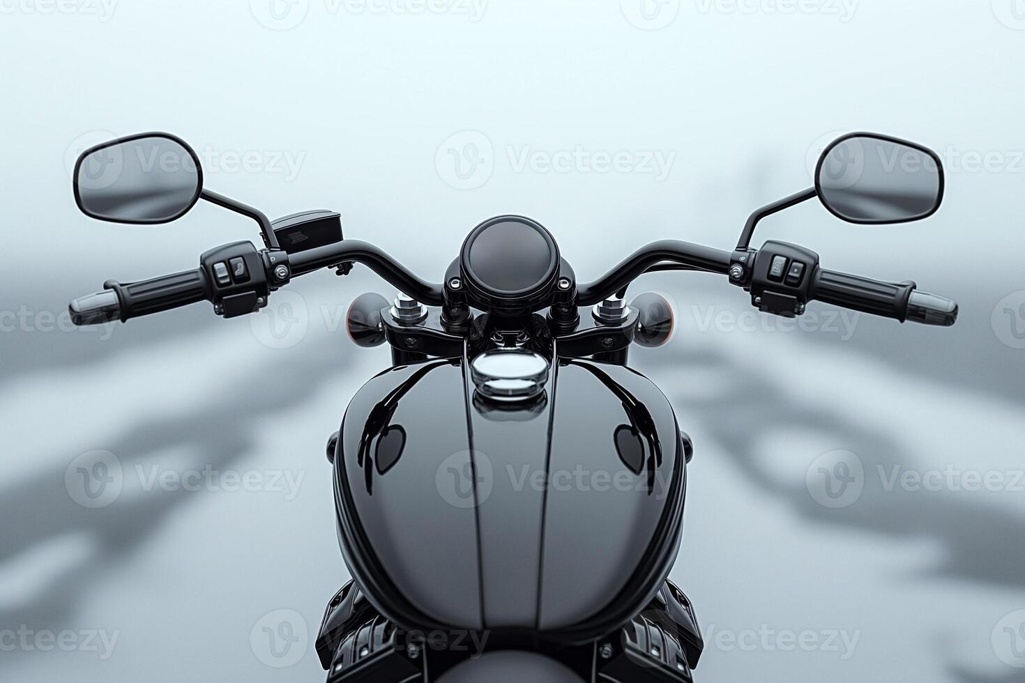 A sleek black motorcycle's handlebars set against a misty backdrop, embodying a sense of freedom and adventure. photo