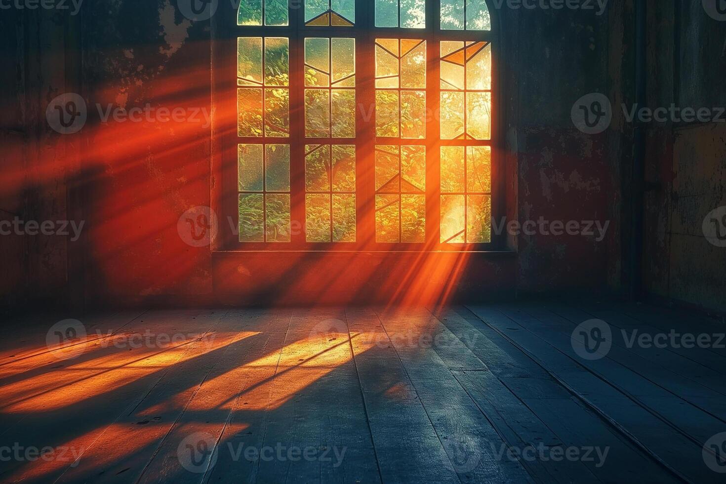 Sunlight streams through an ornate window, illuminating a deserted room with a warm, golden glow. photo