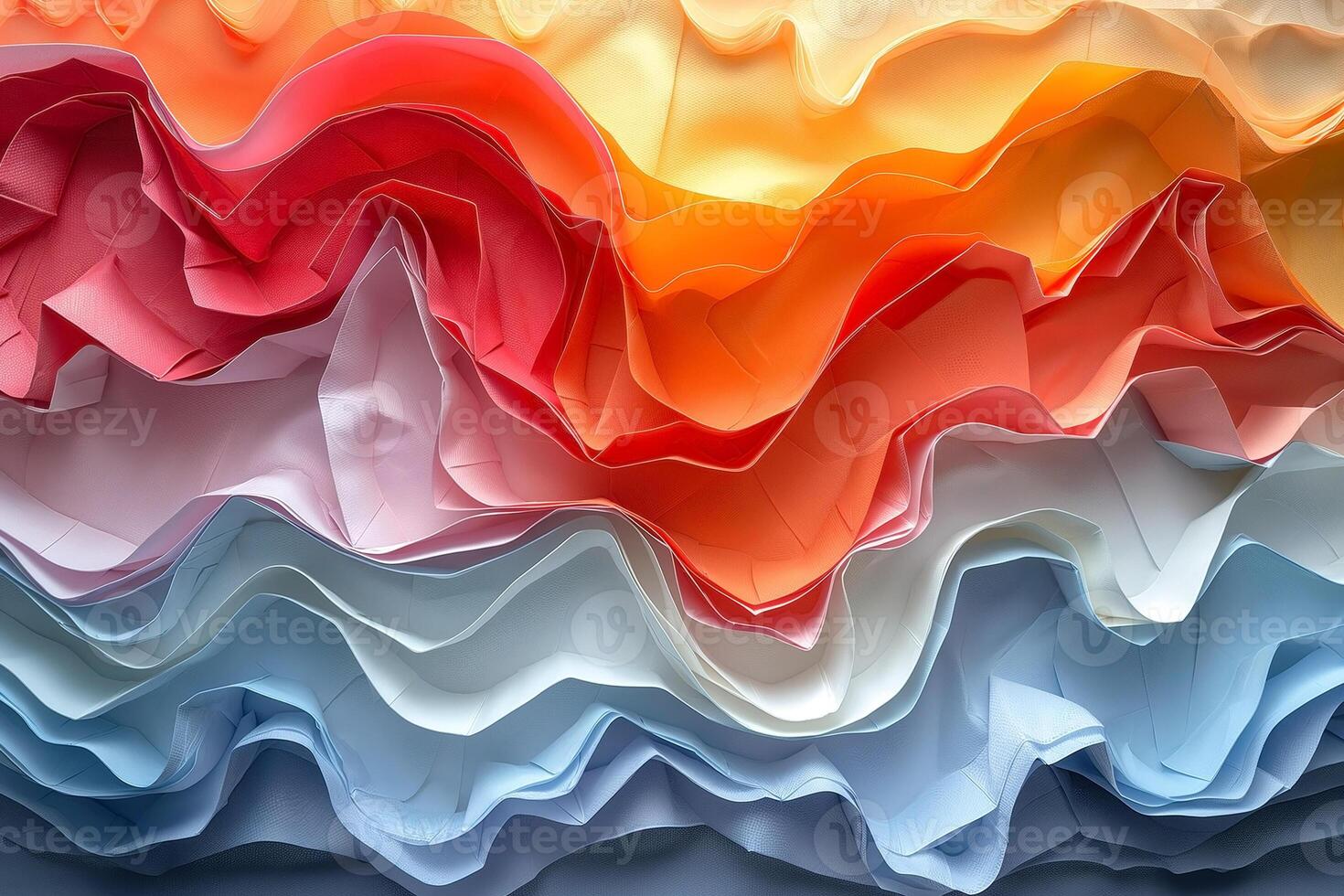 Colorful waves of crumpled paper in shades of orange, red, and blue create an artistic layered effect. photo