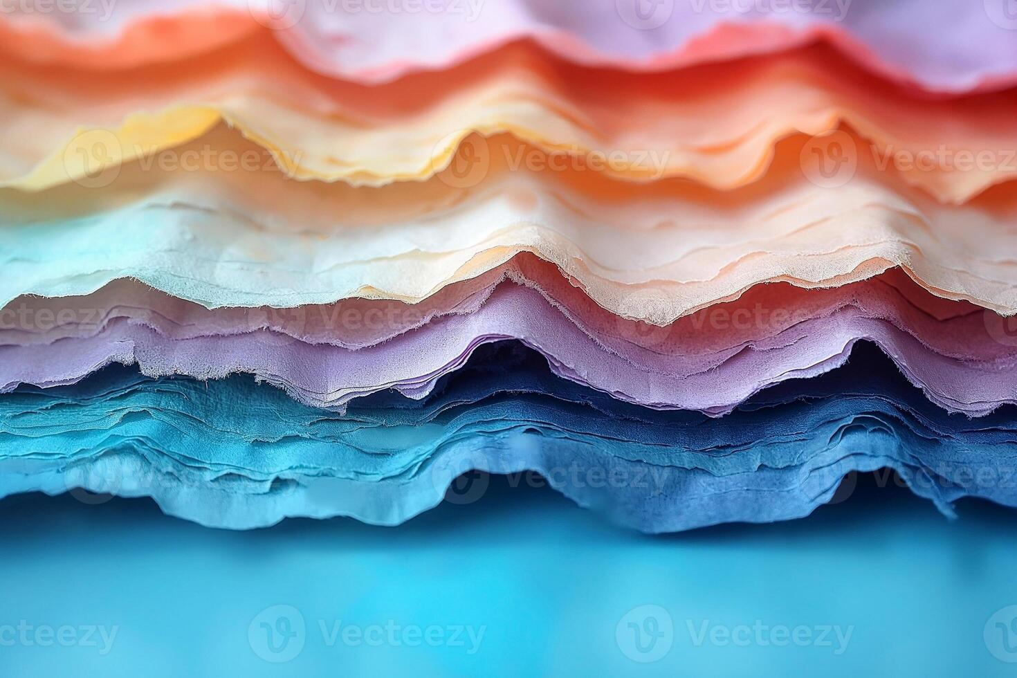 Colorful layered paper in pastel shades, creating a serene and artistic effect. photo