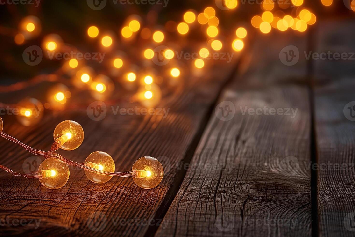 Warm glowing fairy lights on rustic wooden background, creating a cozy and inviting atmosphere. photo