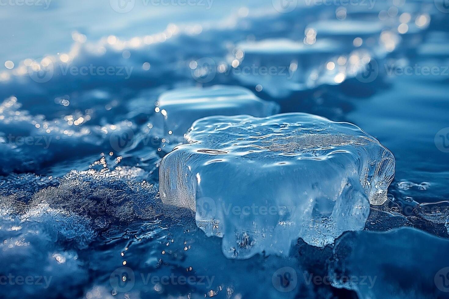 Close-up of crystalline ice on a shimmering blue surface, showcasing nature's delicate beauty. photo