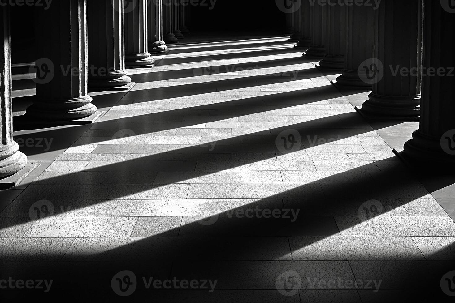 Dramatic shadows cast by classical columns in a serene indoor space. photo