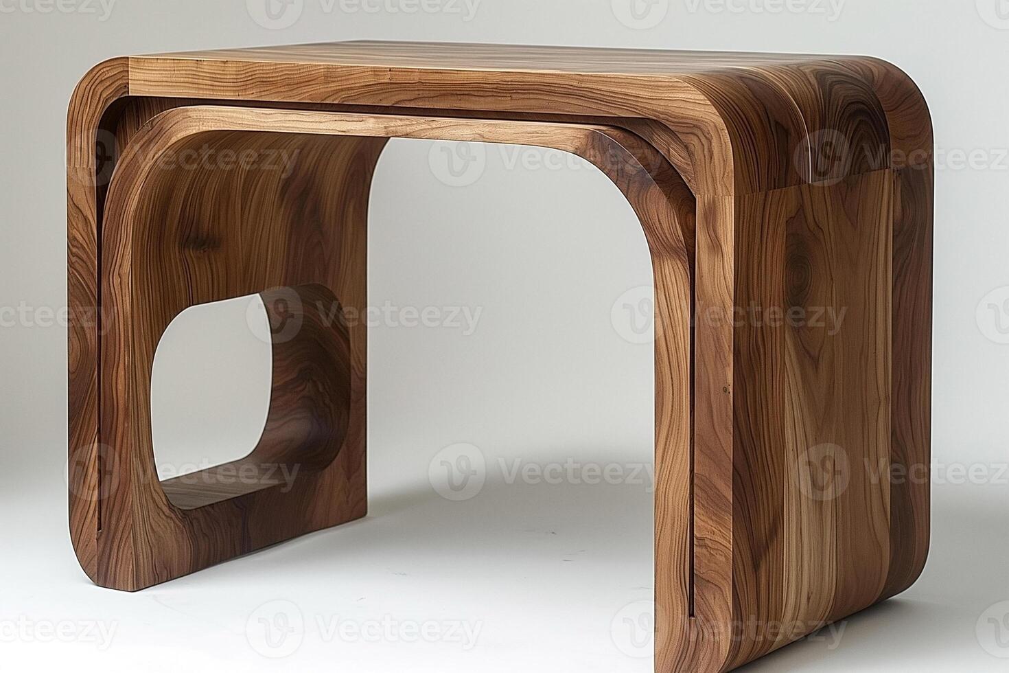 A sleek, modern wooden desk showcasing unique curves and natural grain patterns, adding elegance to any workspace. photo
