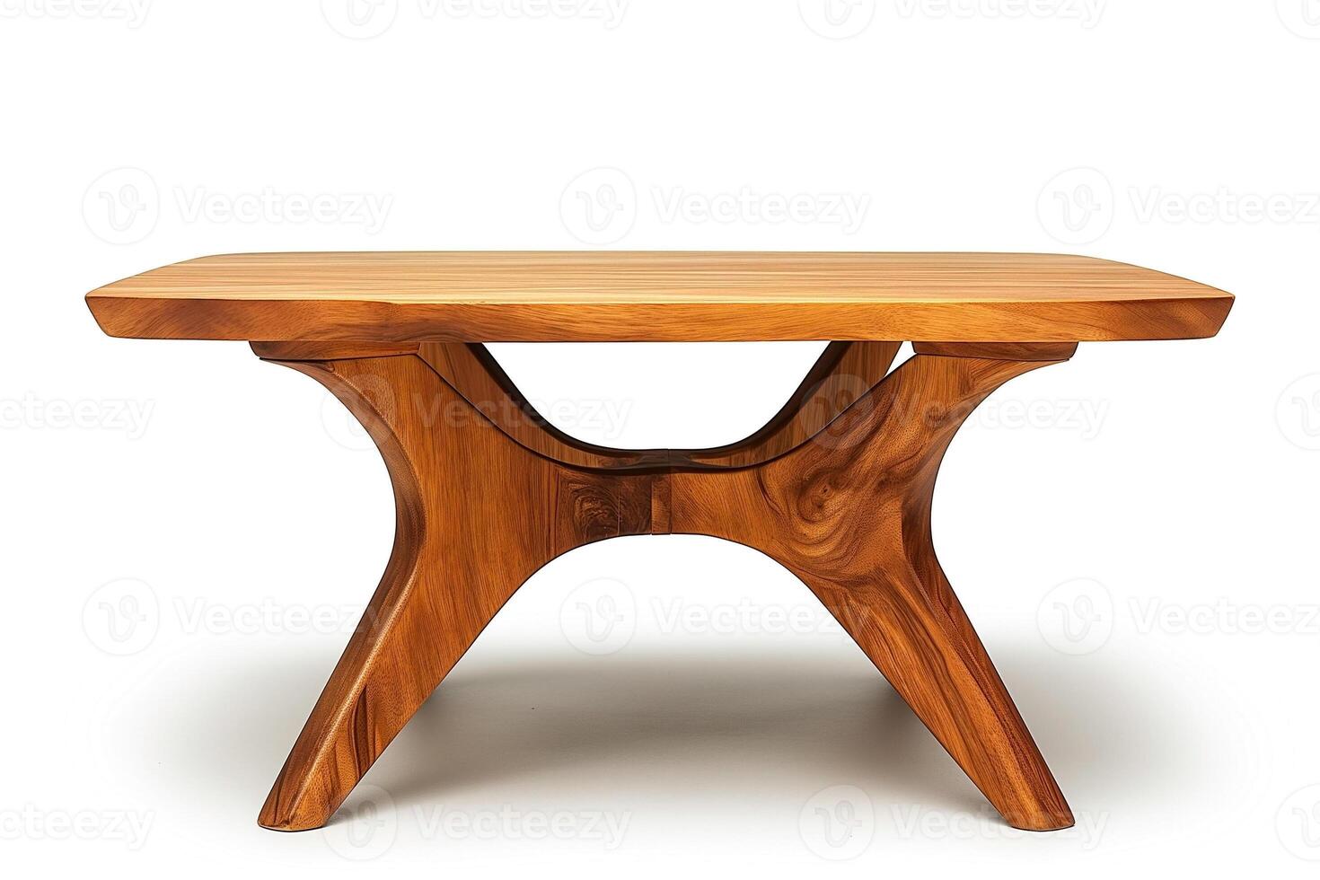 Artistic wooden coffee table with a sleek design, showcasing natural grain patterns and smooth curves. photo