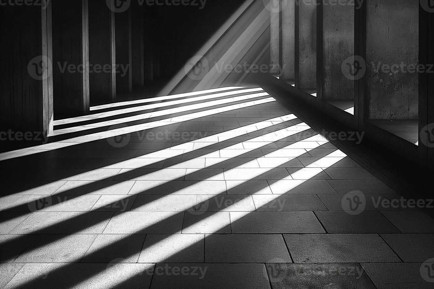 Abstract monochrome image of light and shadow creating striking patterns on a floor. photo