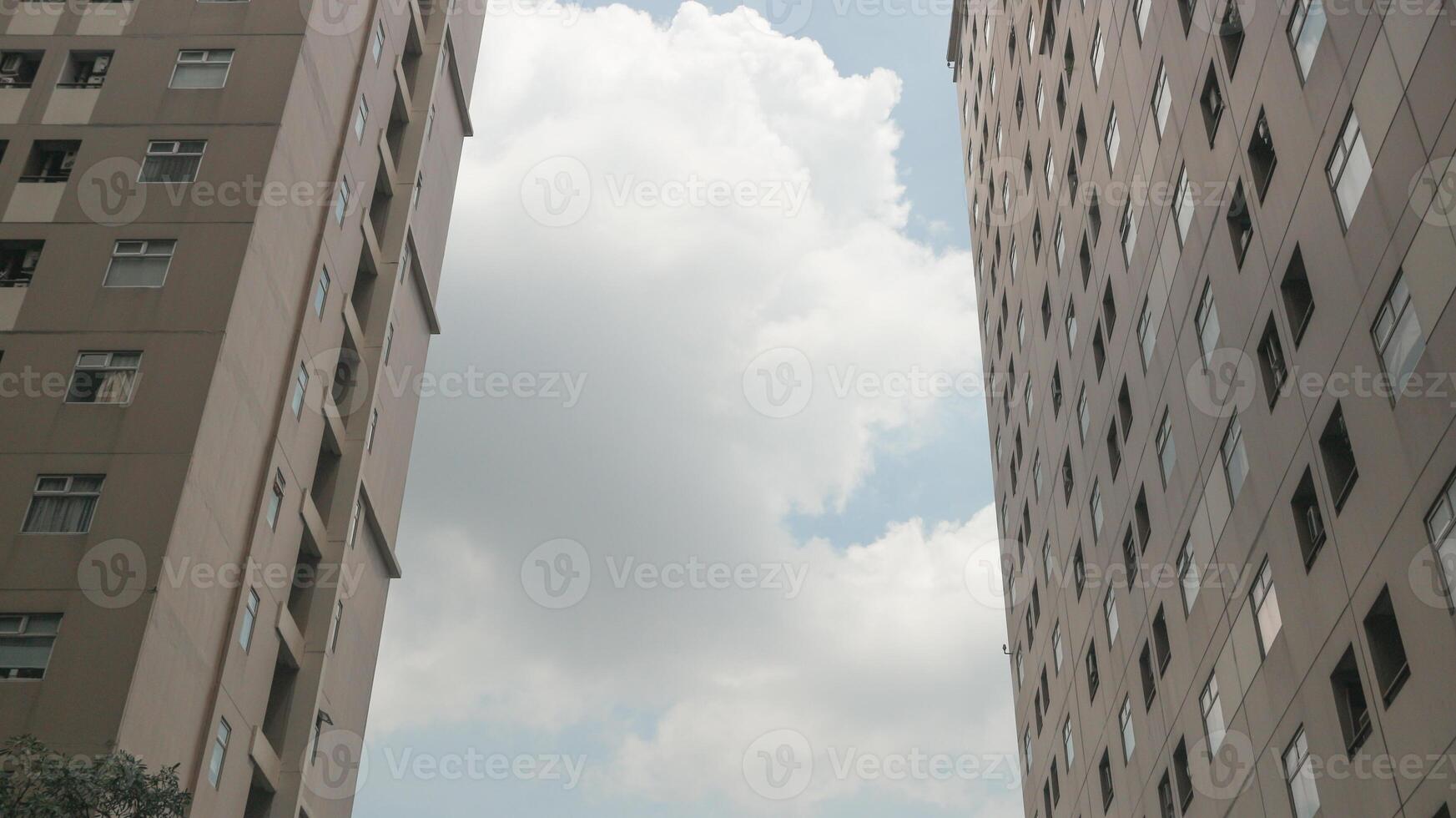 Abstract image of looking up at modern glass and concrete building. photo