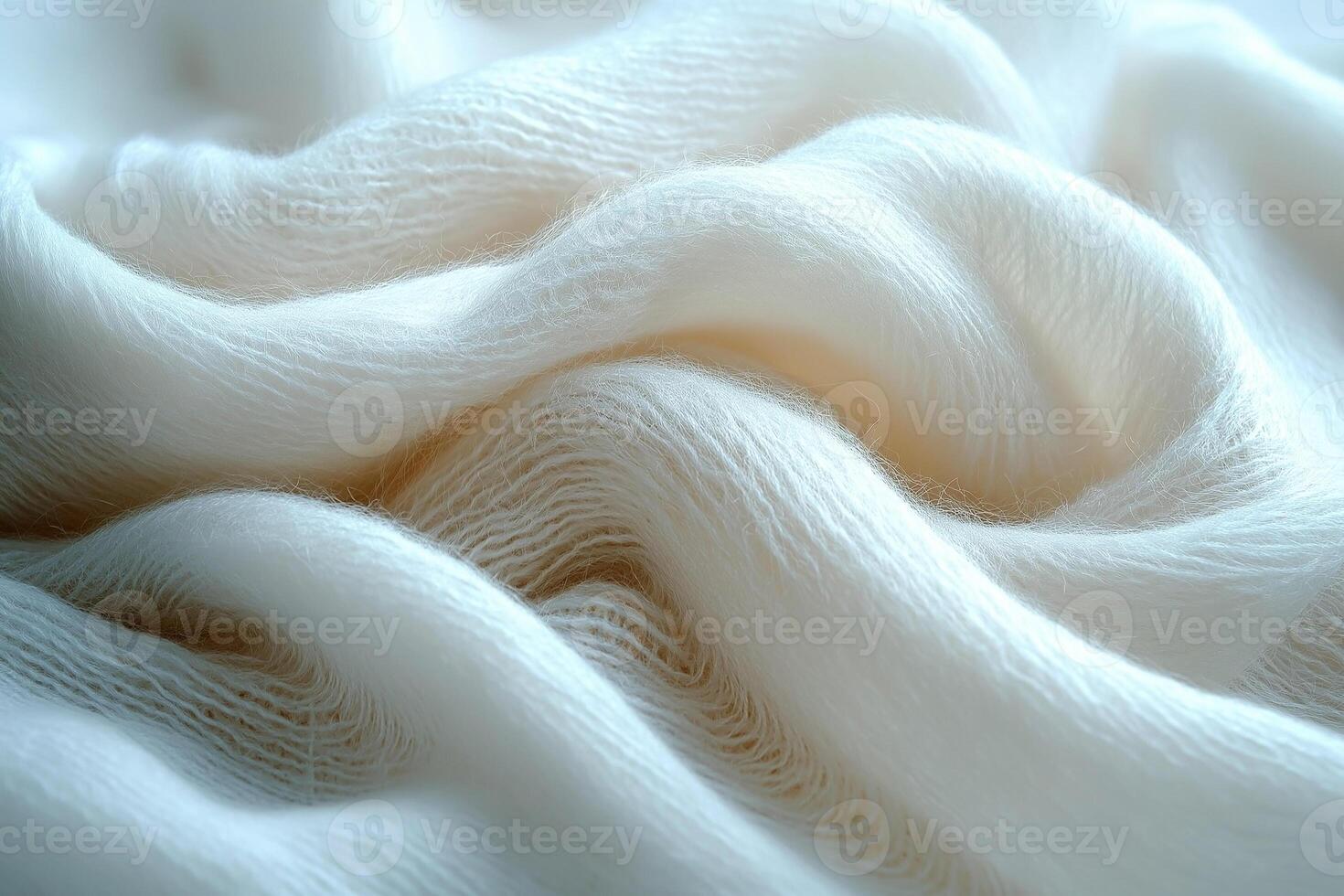 Soft, flowing, and delicate white fabric creating a calming and serene atmosphere. photo