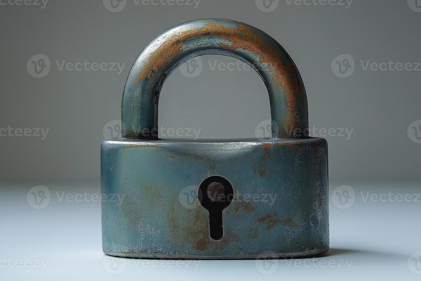 A weathered, blue metal padlock with a keyhole, symbolizing security and protection. photo