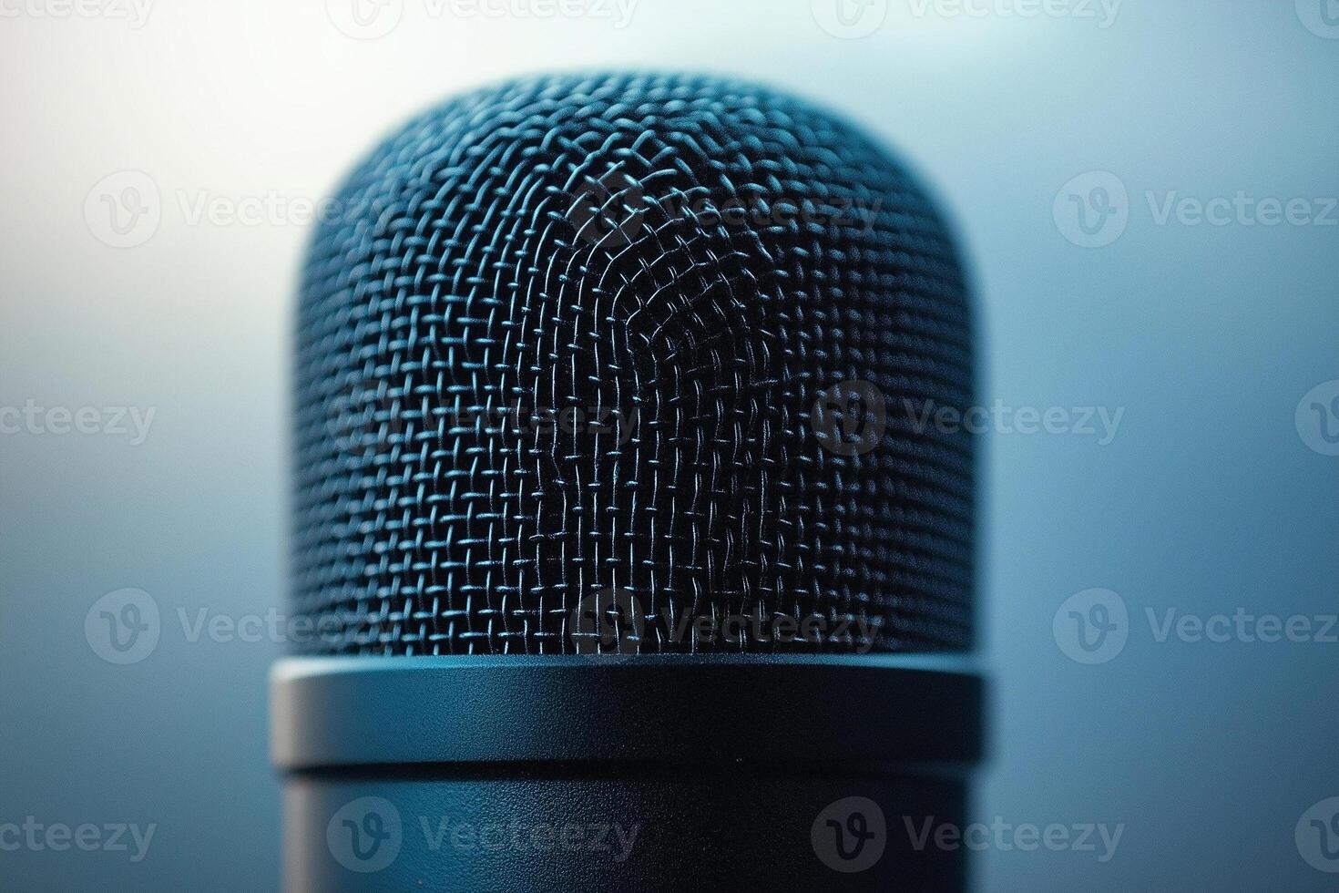 Close-up of a black microphone on a softly lit background, creating a professional and sleek appearance. photo