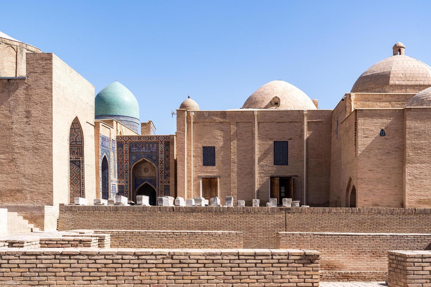 Samarkand, Uzbekistan-august 13, 2023-Shakhi Zinda necropolis, a famous mausoleum complex in Samarkand during a sunny day photo