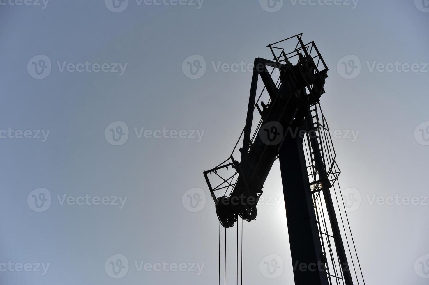 Silhouette of a Crane Against the Sky photo
