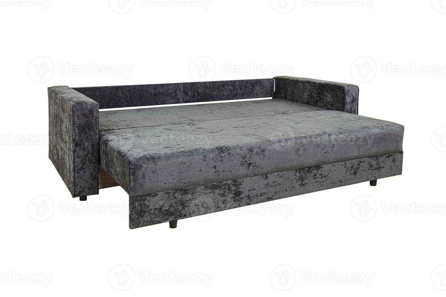 Gray unfolded sofa with velor pillows photo