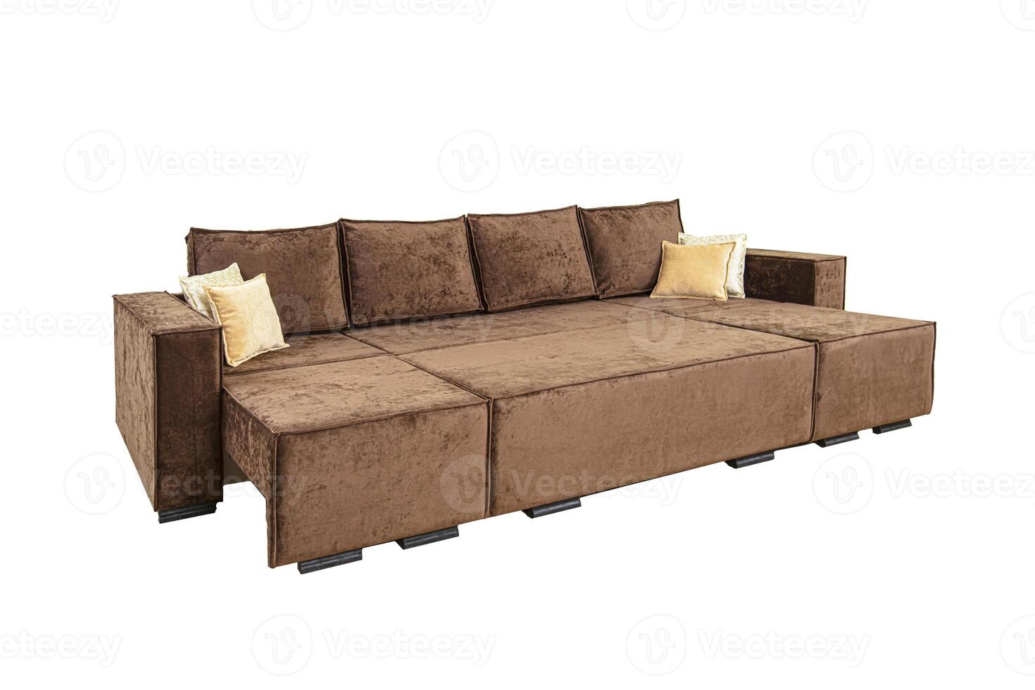 Brown unfolded sofa with velor fabric pillows isolated on a white background photo