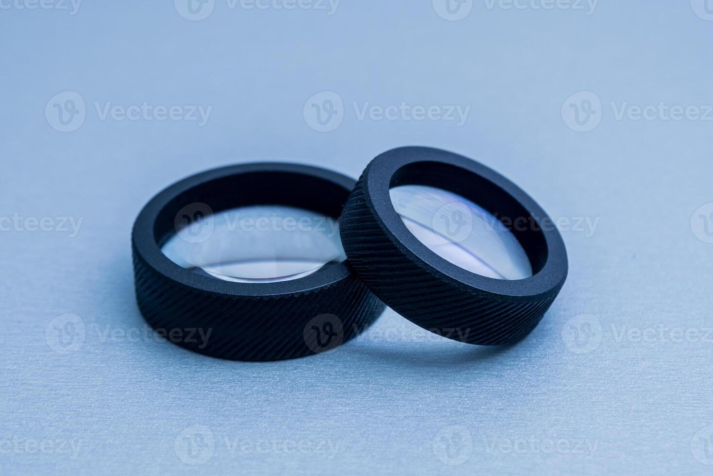 Indirect ophthalmoscopy lens on the grey table. photo