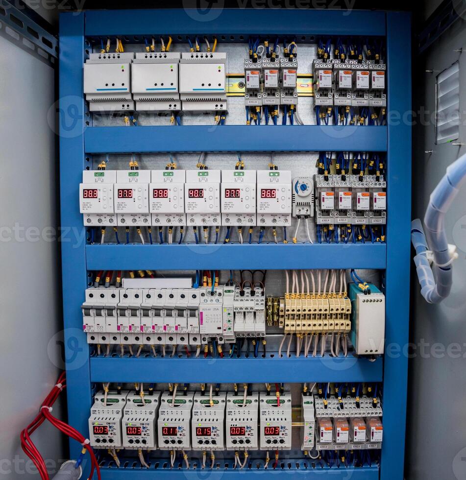 Voltage switchboard with circuit breakers. Modern electrical background photo
