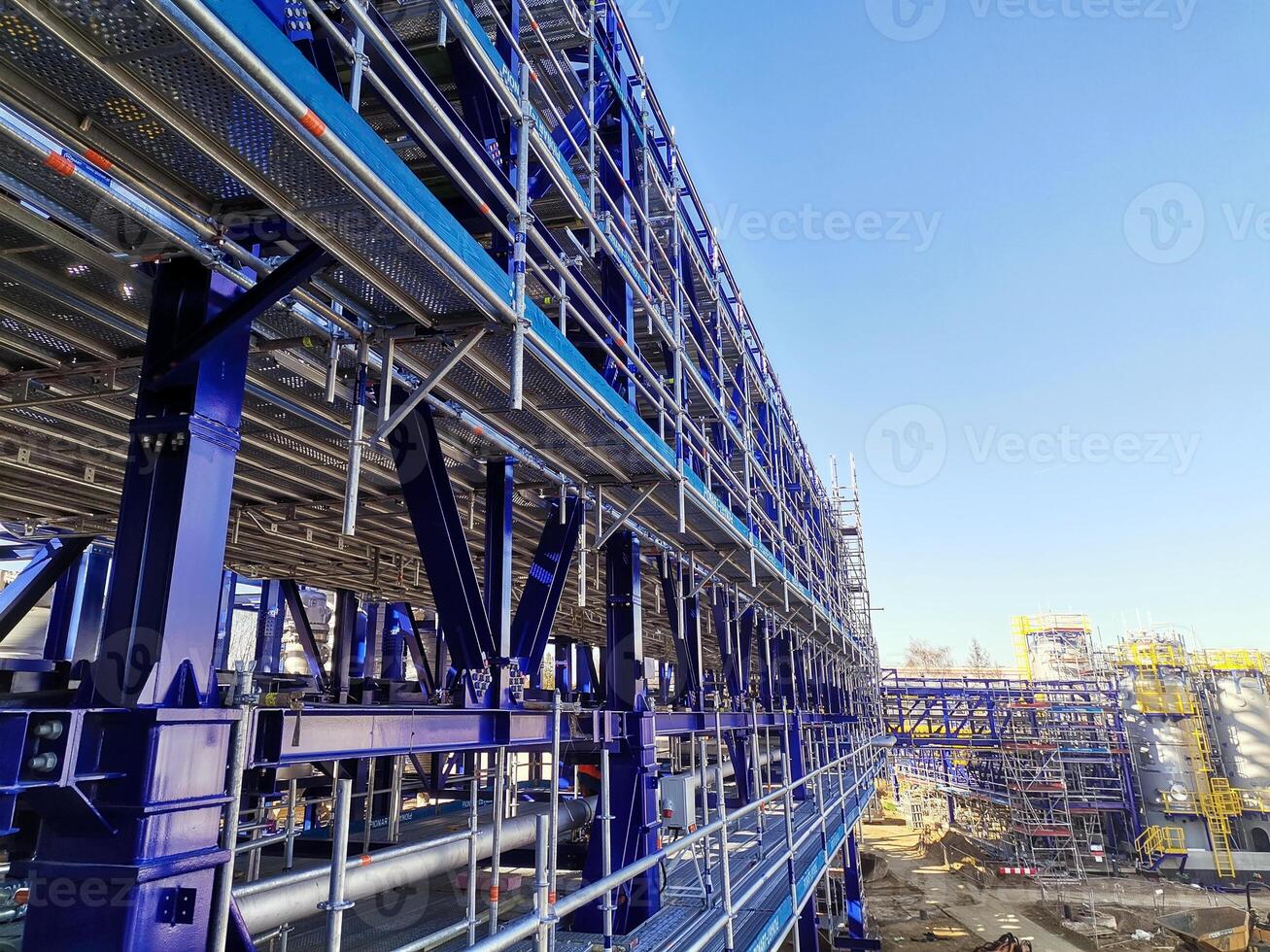 Steel frame structure is under construction on the construction site. photo