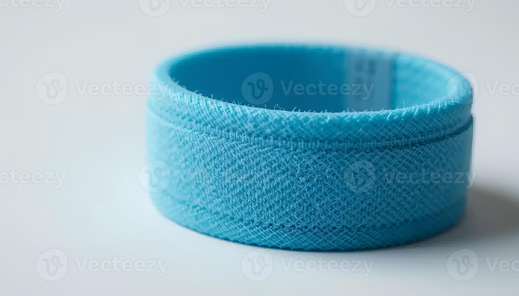 Close-up of Turquoise Fabric Band on White Background for Textile Use photo